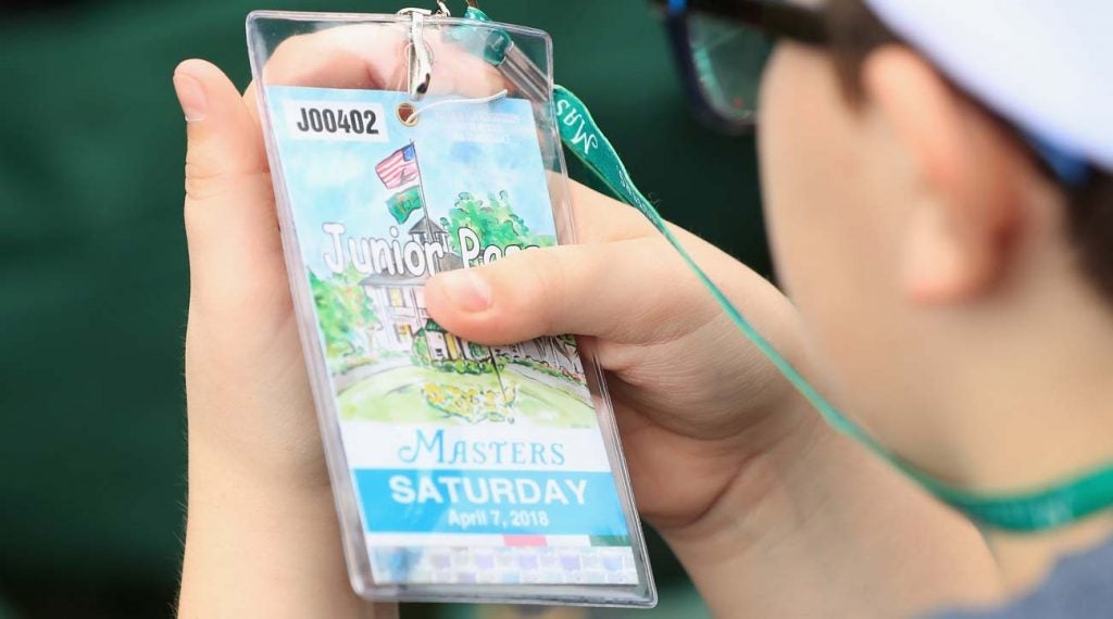 Masters patron inspects his Masters badge