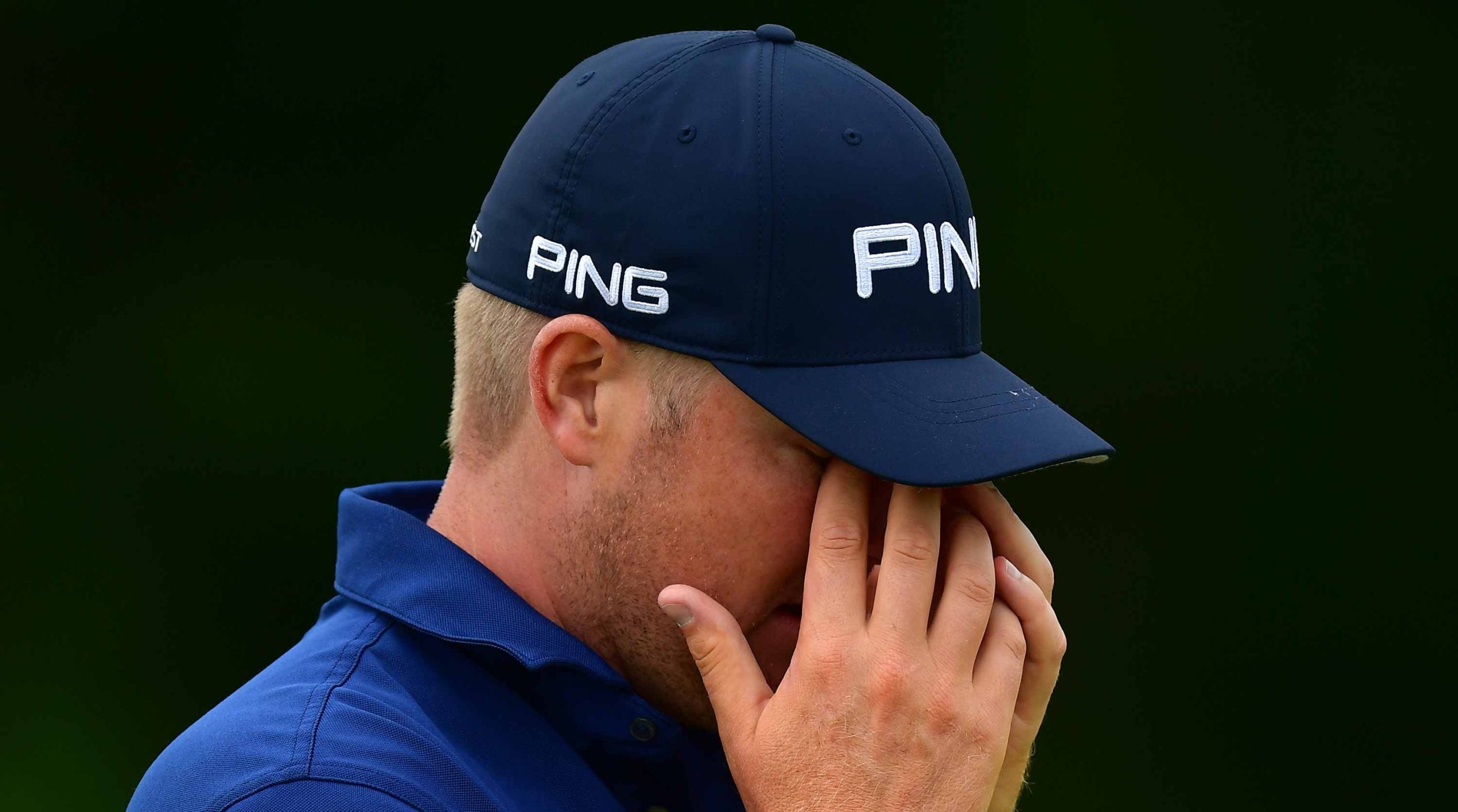 Trey Mullinax grabs his head