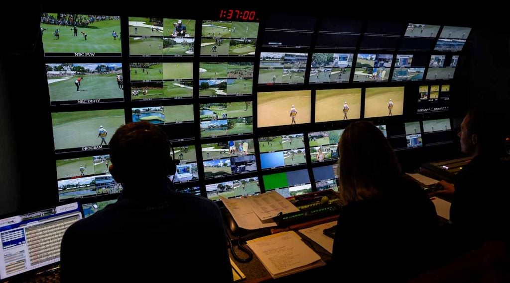 Workers monitor the TV broadcast at the 2015 Players Championship.