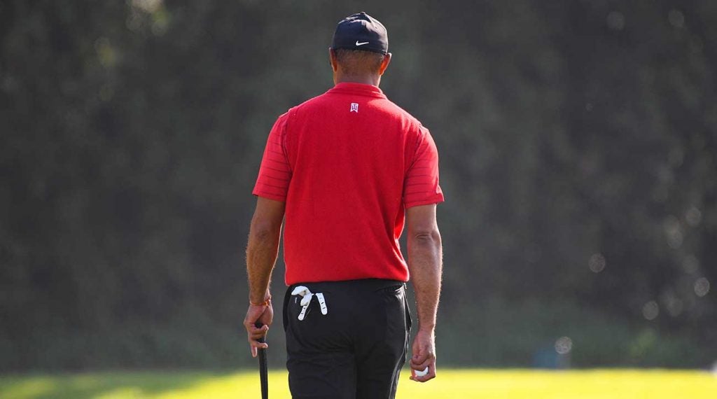 Tiger Woods walks off a green during the final round of the Genesis Invitational last month.