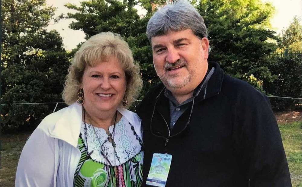 Johnny Pruitt and his wife Christine wearing their Masters badges on Friday in 2018.