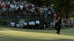 Tiger Woods chasing putt