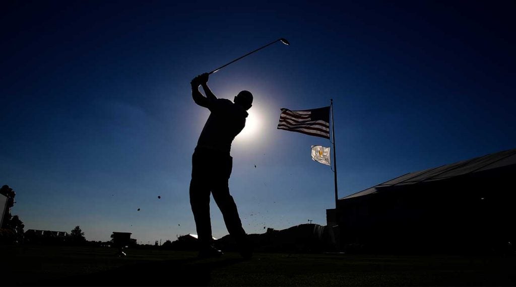 Golfer tee shot american flag