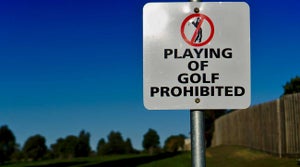 A sign prohibiting the playing of golf.