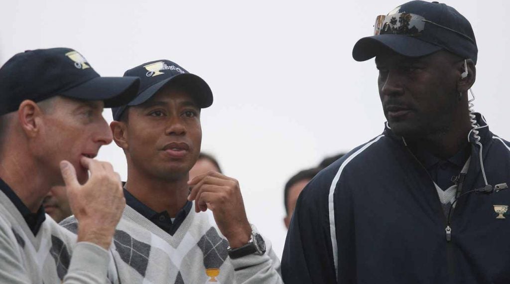 Jim Furyk stands with Woods and Jordan at the 2009 Presidents Cup at Harding Park.