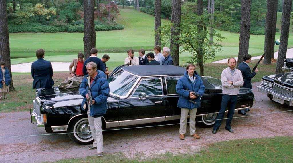 Heavily armed Secret Service agents surrounded President Reagan’s limousine during the hostage incident at Augusta National.