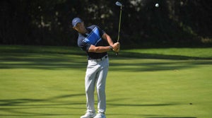 rory mcilroy hits a chip shot