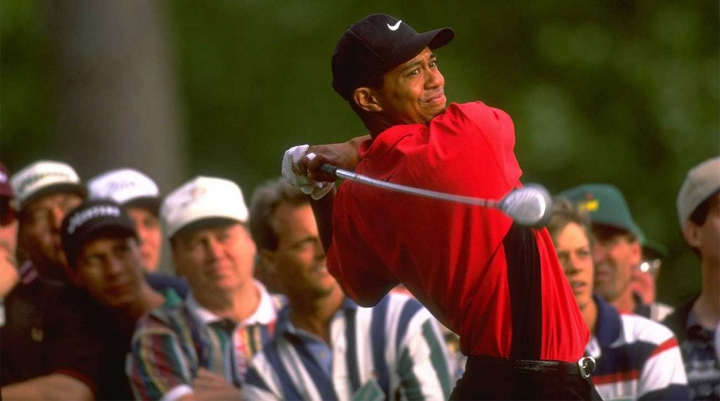 Tiger Woods tees off during the 1997 Masters, where he won his first major title.