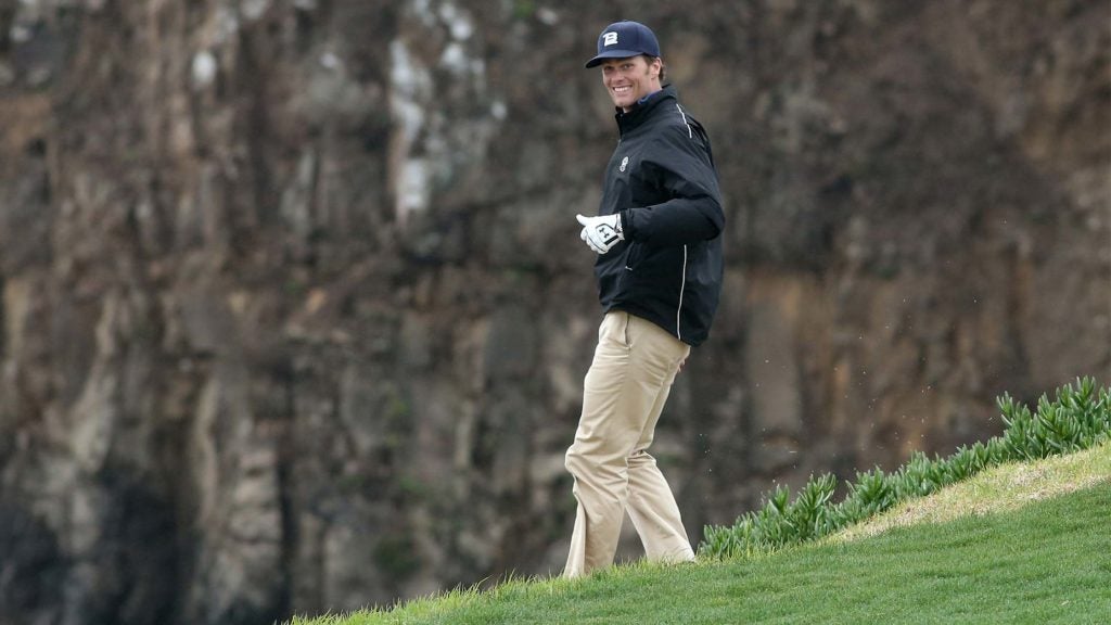 Tom Brady gives a thumbs up at Pebble Beach.