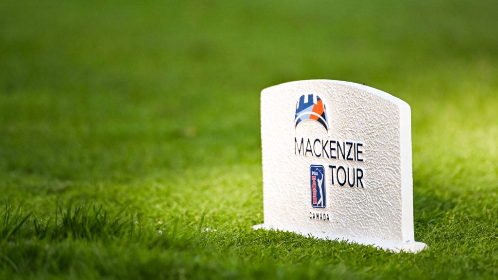 A tee marker with the Mackenzie Tour - PGA Tour Canada logo.