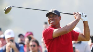 Tiger Woods tees off during an event earlier this year.