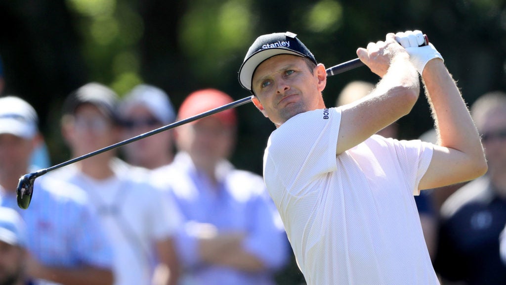 Justin Rose hits a tee shot during the Players Championship.
