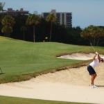 Dustin Johnson hits out of a bunker on Sunday.