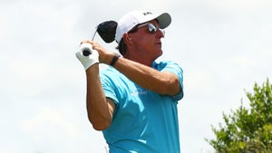 Phil Mickelson hits a tee shot during his practice round on Saturday.