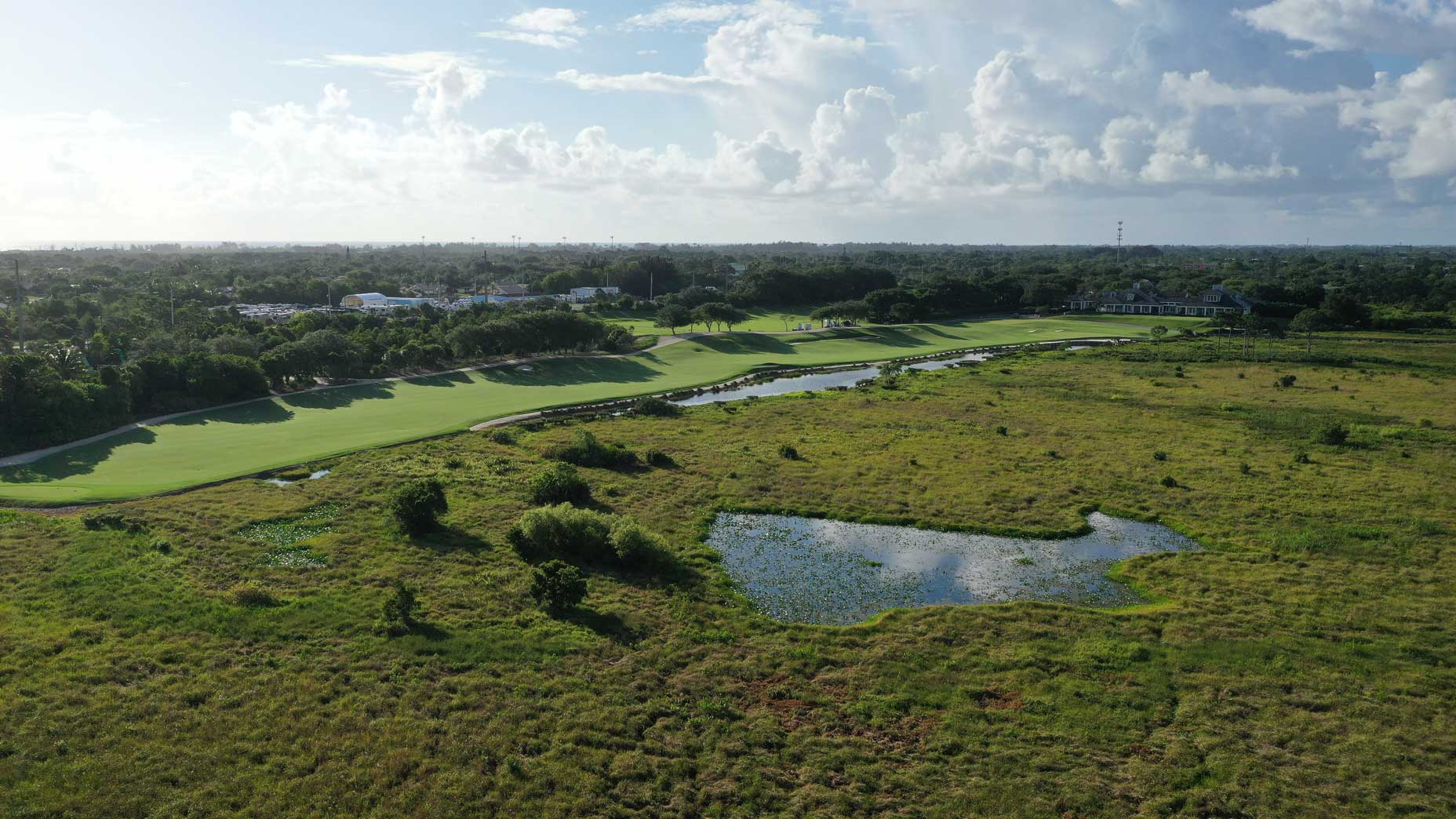 An aerial drone view of the 18th hole at Medalist Golf Club.