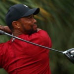 Tiger Woods hits a drive during The Match: Champions for Charity.