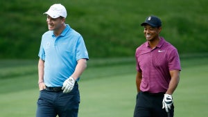 Peyton Manning and Tiger Woods at an event in 2018.