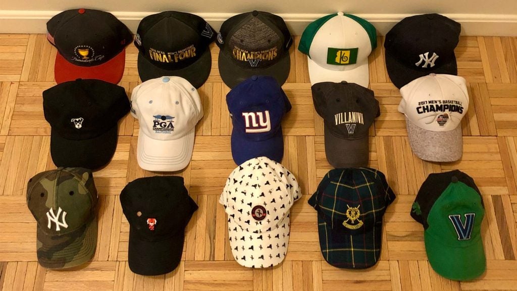 15 hats on the floor together.