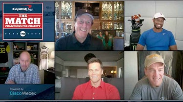Clockwise from top left, Phil Mickelson, Tiger Woods, Peyton Manning and Tom Brady discuss their upcoming match, with host Ernie Johnson, far left.