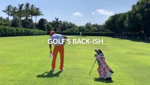 Rickie Fowler observes proper social distancing.