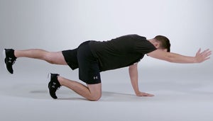Man does core stability exercise to help golf game.