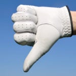 golfer giving a thumbs down