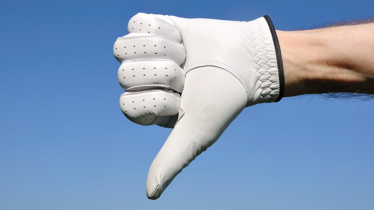 golfer giving a thumbs down