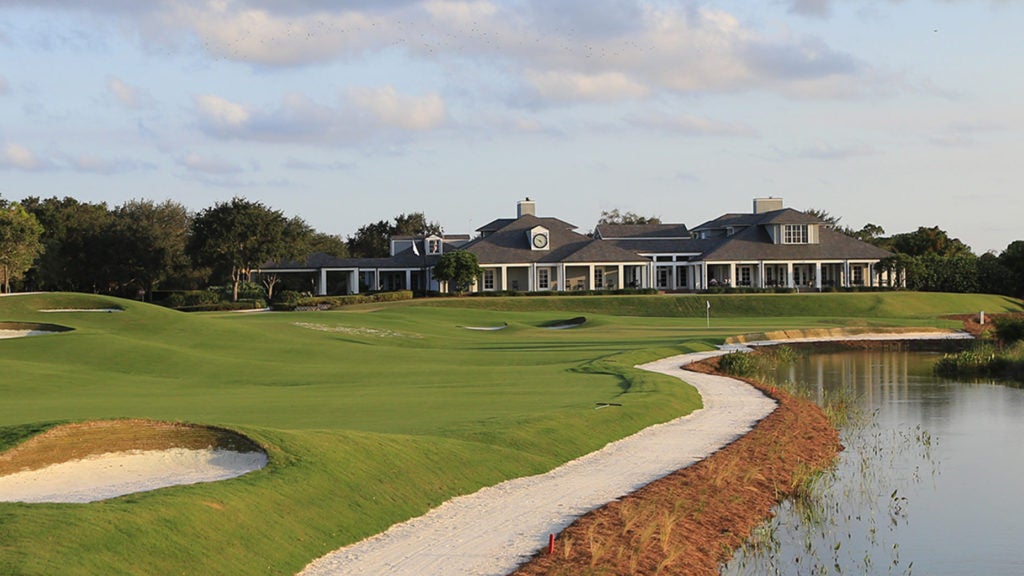 A view of the 18th green and clubhouse at Medalist Golf Club.