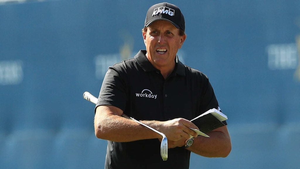 Pro golfer Phil Mickelson holds putter