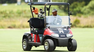 Tiger woods in golf cart