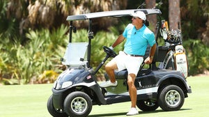 Phil Mickelson steps out of golf cart