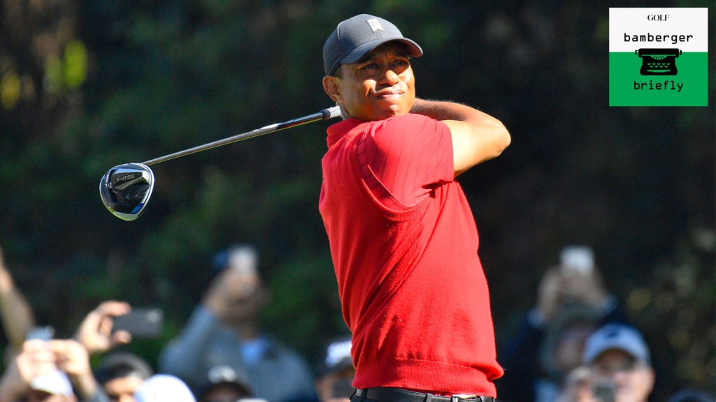 Tiger Woods swings.