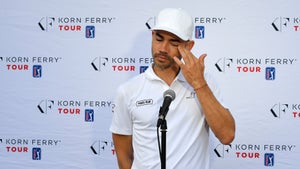 Camilo Villegas wipes away tears while speaking to the press on Wednesday.