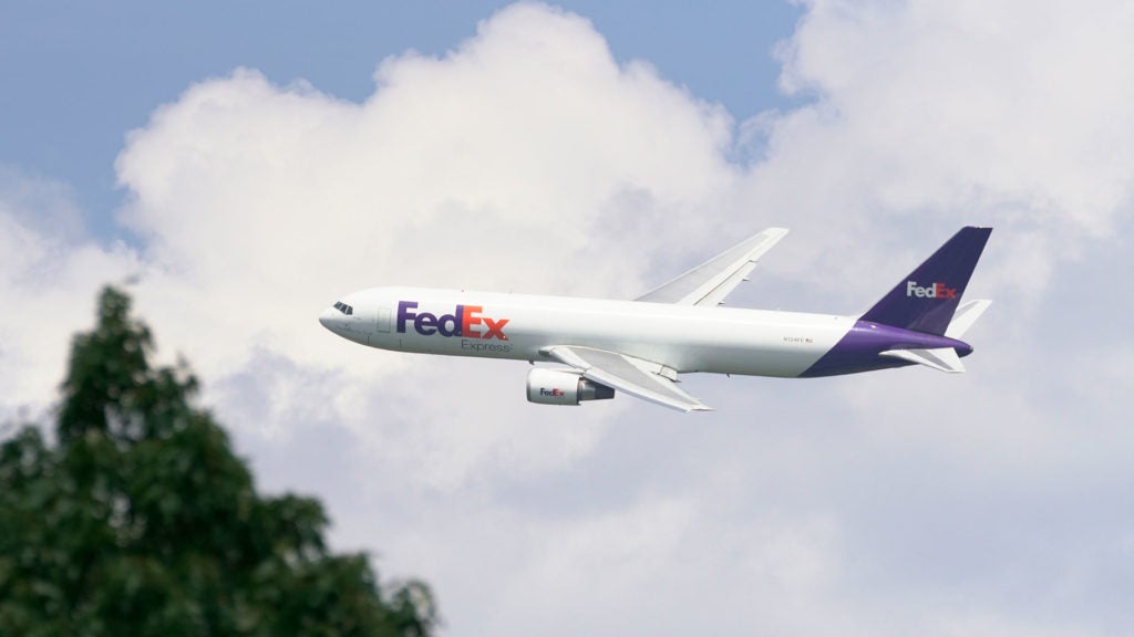 Fedex Plane flying over golf course