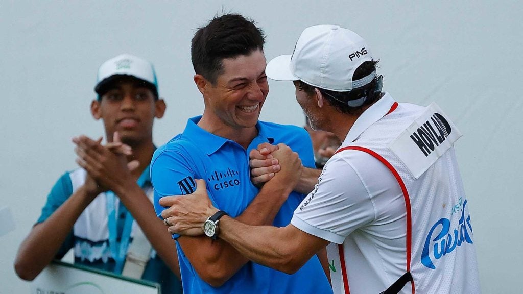 Viktor Hovland and caddie Shay Knight at the Puerto Rico Open in February.