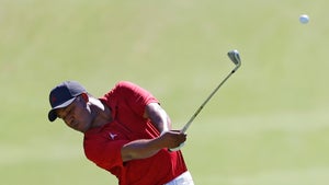 Harold Varner hits a shot on the 18th hole at Colonial Country Club.