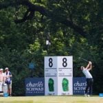 Scottie Scheffler hits his tee shot on the 8th hole at Colonial Country Club.