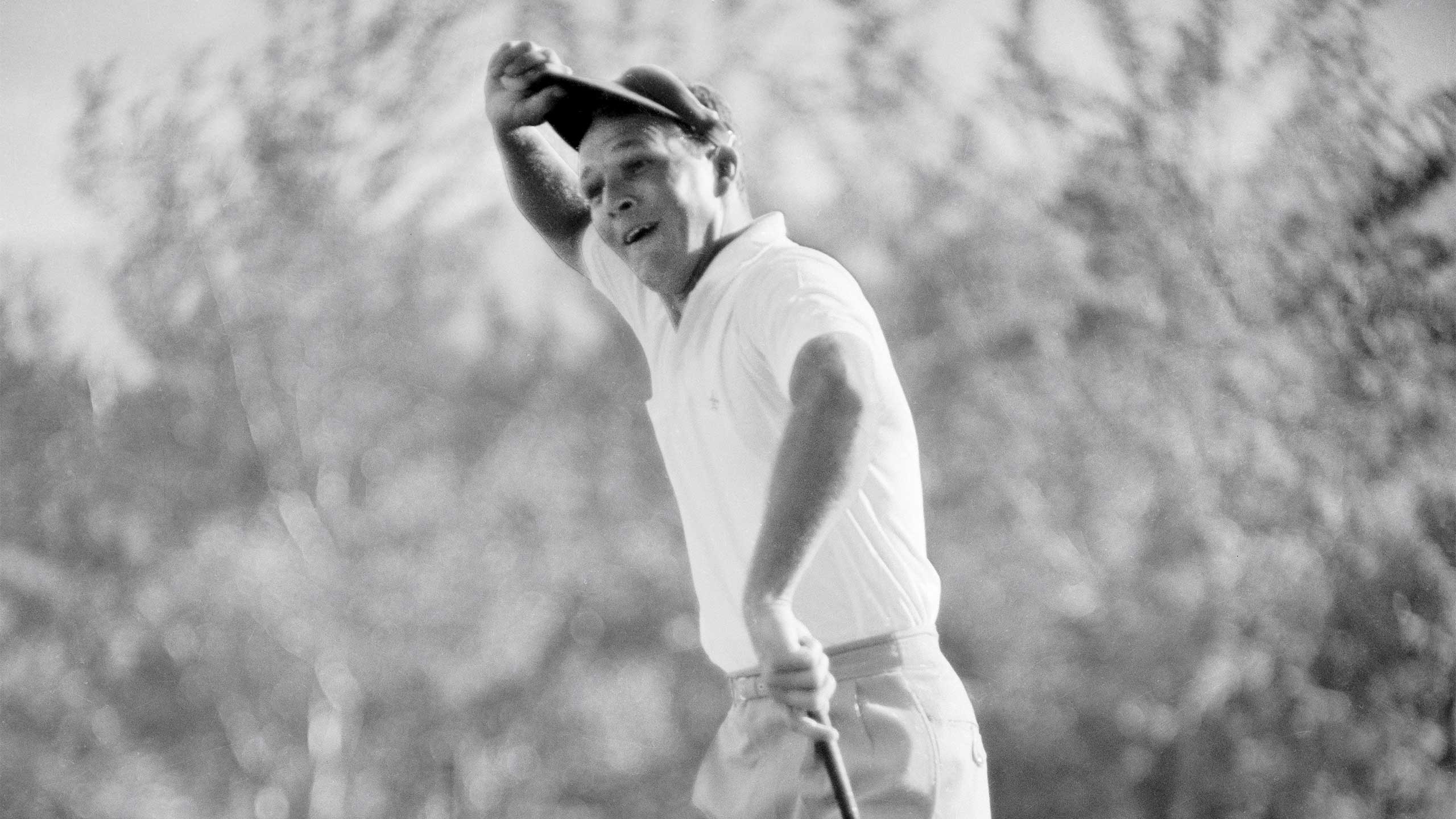Arnold Palmer celebrates winning the 1960 U.S. Open.