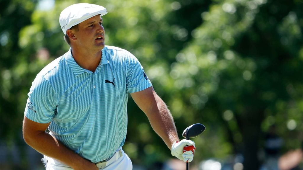 Bryson DeChambeau watches a drive on Sunday at Colonial.