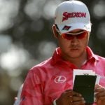 hideki matsuyama reads yardage book