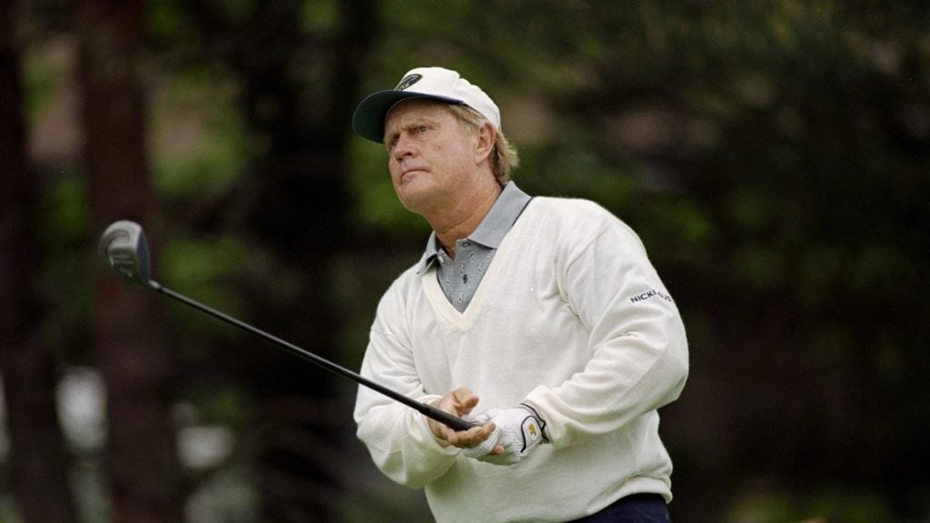 jack nicklaus holds driver after swing