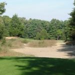 The tee shot on the par-4 11th at Pine Valley.