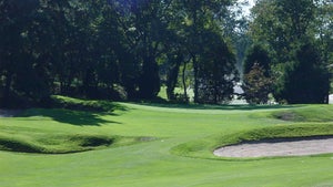 The approach to the par-4 11th green at Pine Valley.