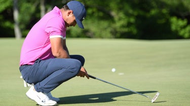 brooks koepka crouches after missing putt