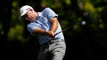 Pro golfer Stewart Cink hits drive