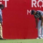 Bryson DeChambeau takes a drop at the Rocket Mortgage Classic.