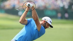 dustin johnson at the top of the backswing
