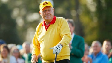 jack nicklaus in a yellow sweater
