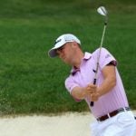 Justin Thomas hits out of the bunker