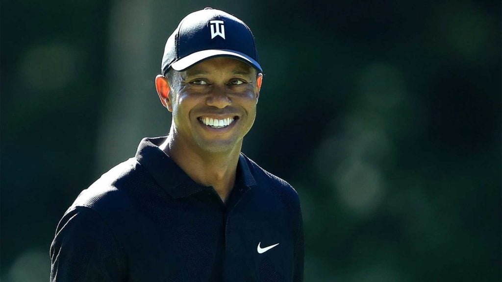 Tiger Woods smiles at the Memorial.